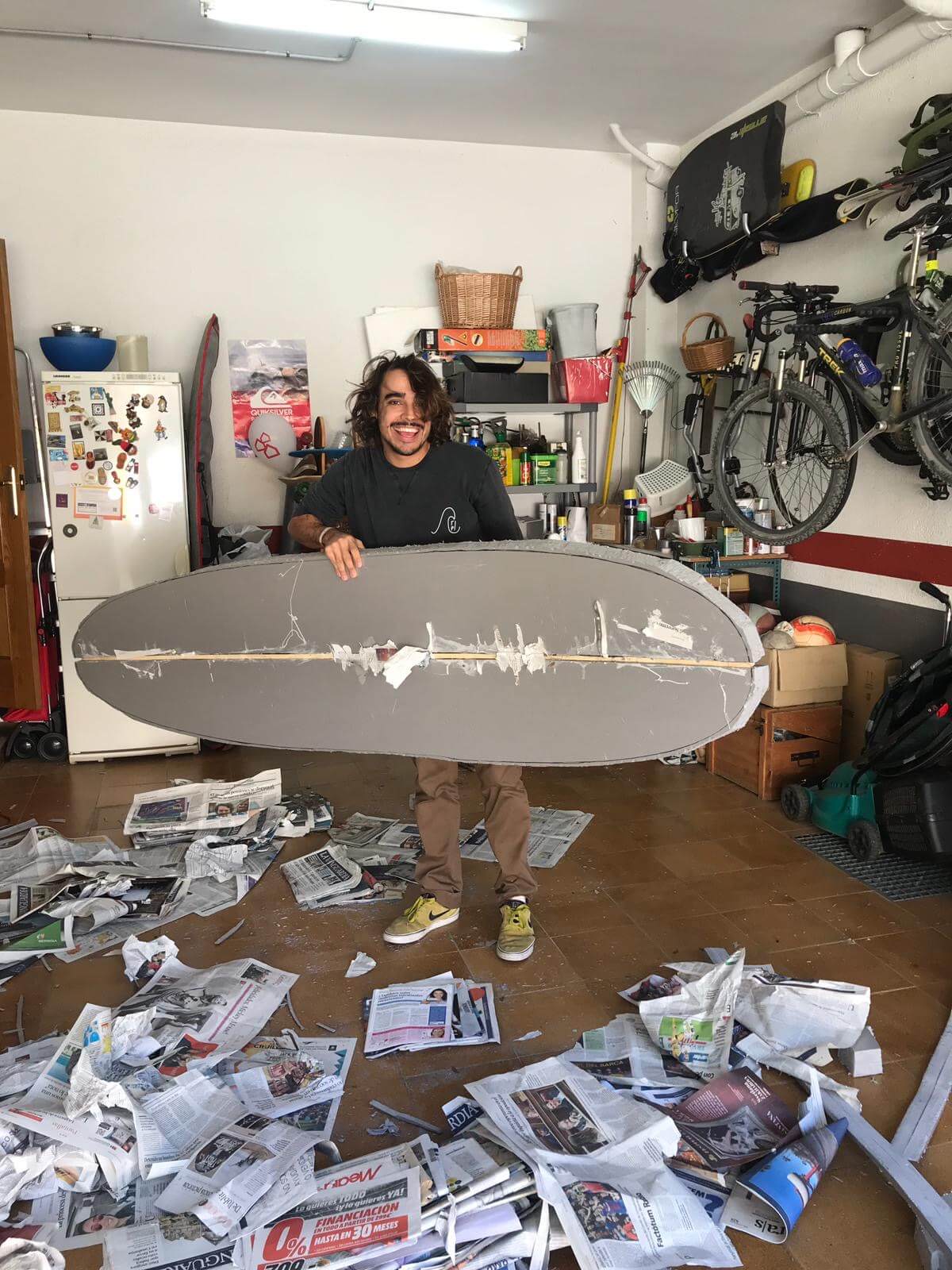 me creating a surfboard
